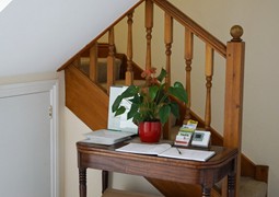 Guest hallway and stairs leading to bedrooms
